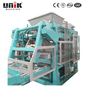 Máquina para fabricar bloques de hormigón con alimentador automático